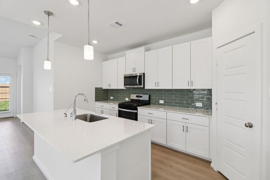 Furnished interior view inside a new home in Pine Lake Cove - Premier Series, Montgomery (Image 10).