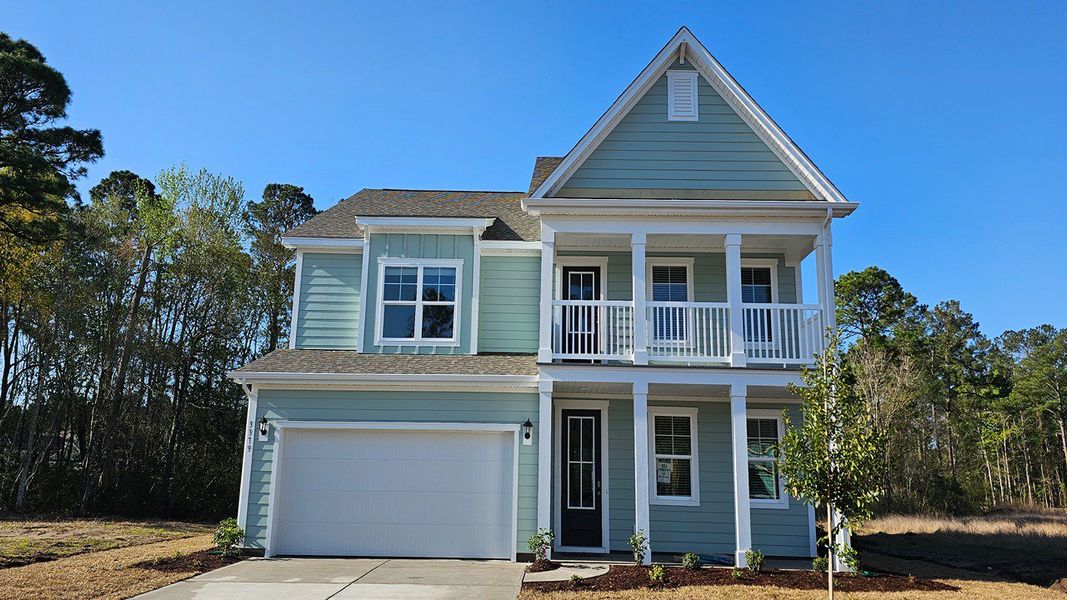 Representative exterior photo of a completed home built from the Harbor Oak by D.R. Horton in The Preserve at Shaftesbury Glen, Conway, SC (Image 1).