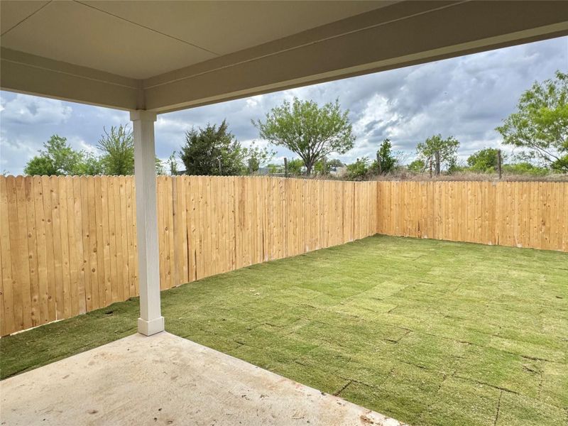 Exterior details and patio area of a home in Carillon, Manor (Image 3).