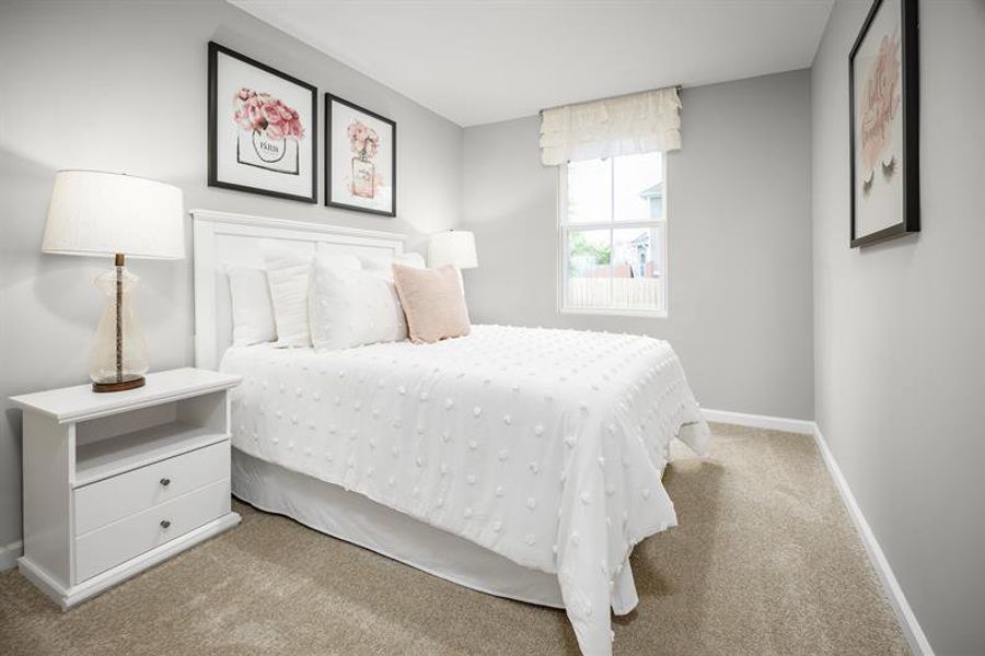 Representative furnished interior of a home built from the Poplar by Ryan Homes in Wrenn Farms Townhomes, Youngsville (Image 11).