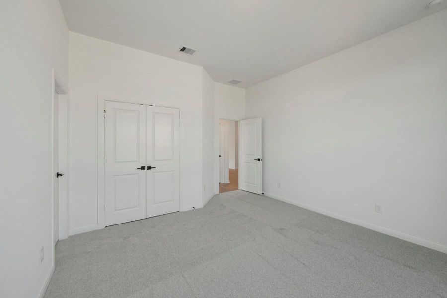 Spacious, unfurnished interior of a new home in The Grand Prairie 50’, Hockley (Image 26).