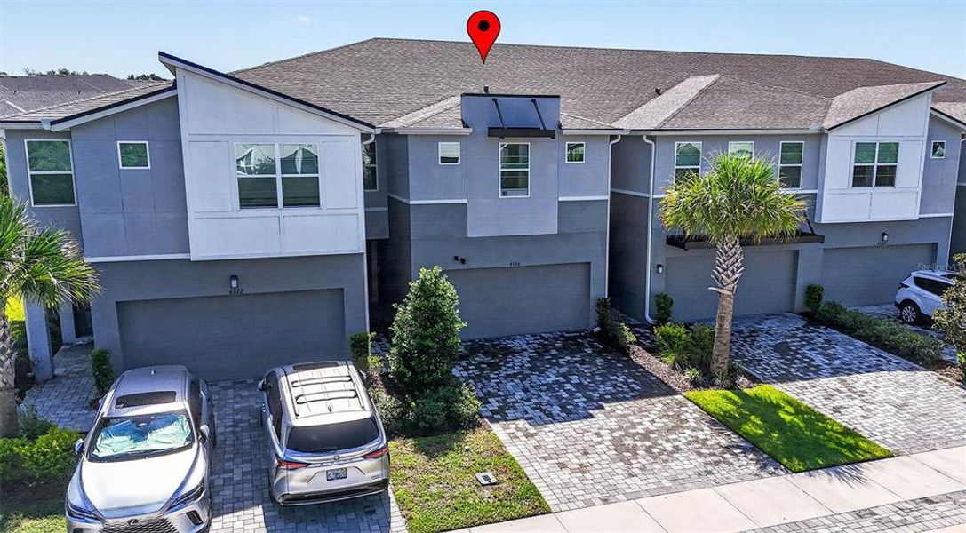 Front exterior of a new home in , Lutz, FL, highlighting curb appeal (Image 26).