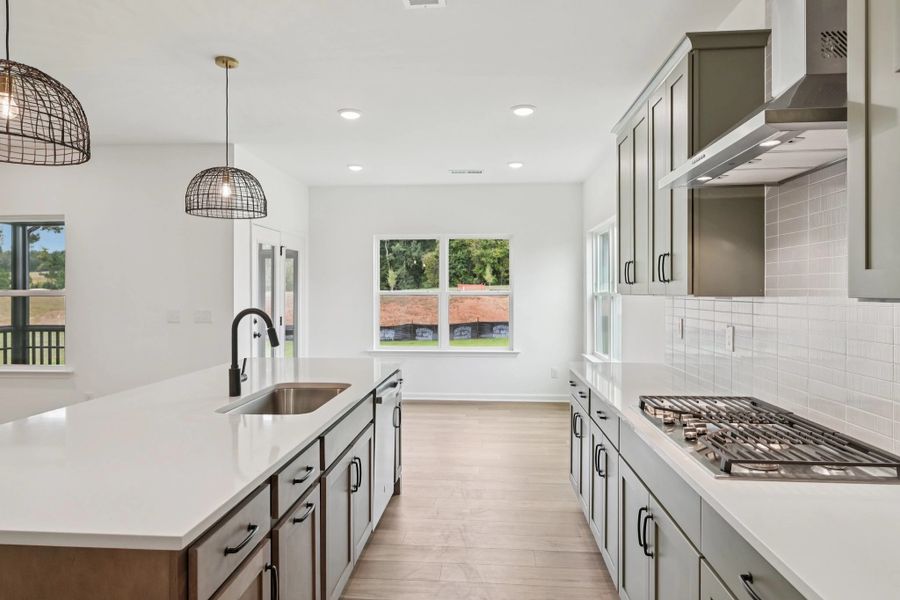 Kitchen featuring the AW Collection® Rosemary - Matte black, light wood, and garden-inspired style. Kitchen featuring the AW Collection® Rosemary - Matte black, light wood, and garden-inspired style.