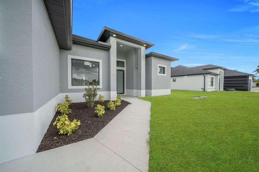 Exterior details and patio area of a home in , Lehigh Acres (Image 3).