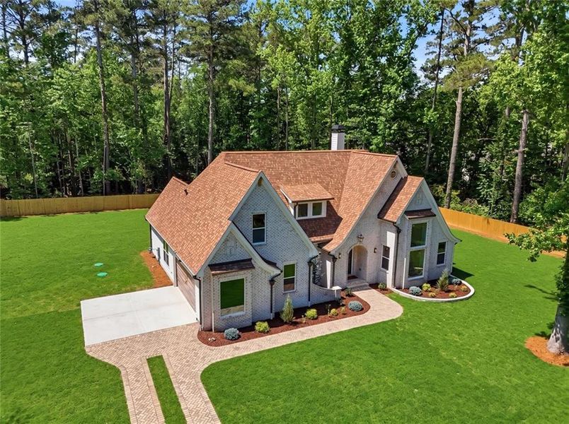 Front exterior of a new home in , Powder Springs, GA, highlighting curb appeal (Image 31).