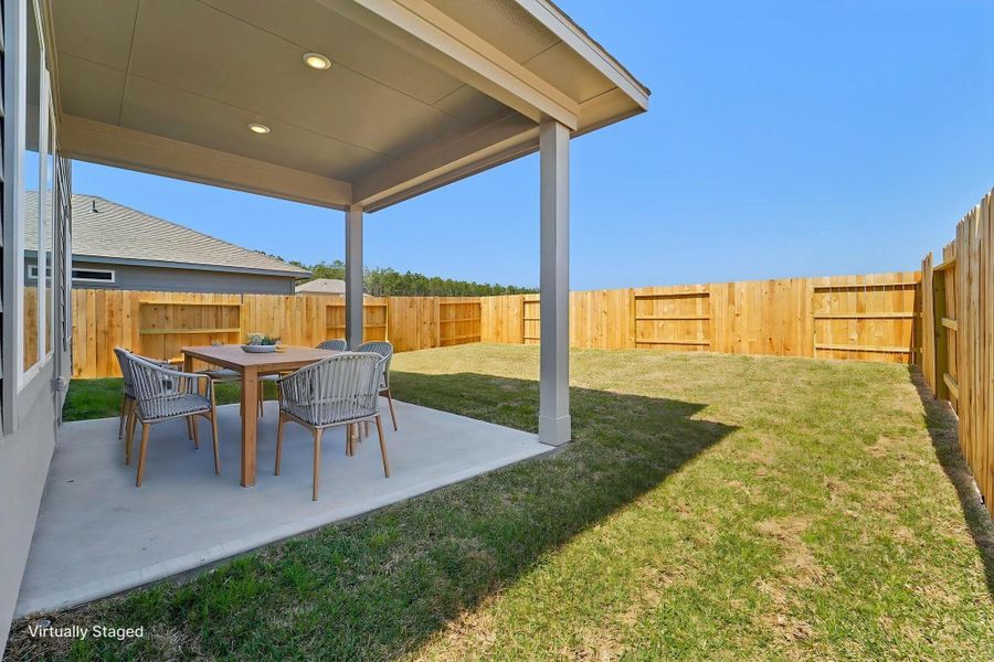 Exterior details and patio area of a home in Granger Pointe - Traditional Series, Conroe (Image 3).