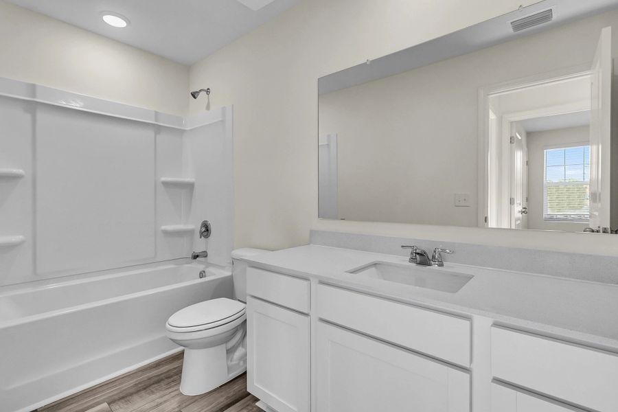 Representative furnished interior of a home built from the Supernova by Starlight Homes in Liberte, Converse (Image 15).