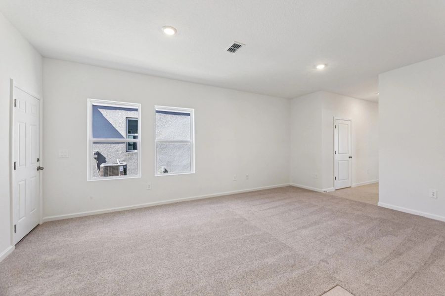 Representative unfurnished interior of a home built from the Ellis by Starlight Homes in Hawks Run, Kissimmee (Image 16).