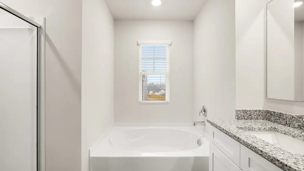 Furnished interior view inside a new home in Southwind Village, Evans (Image 11).