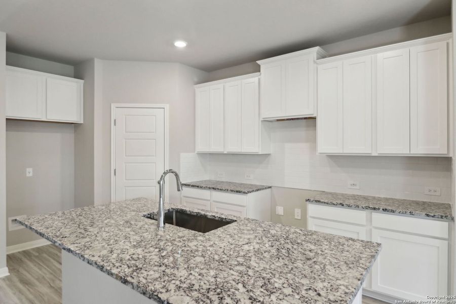 Furnished interior view inside a new home in Thomas Pond, San Antonio (Image 10).