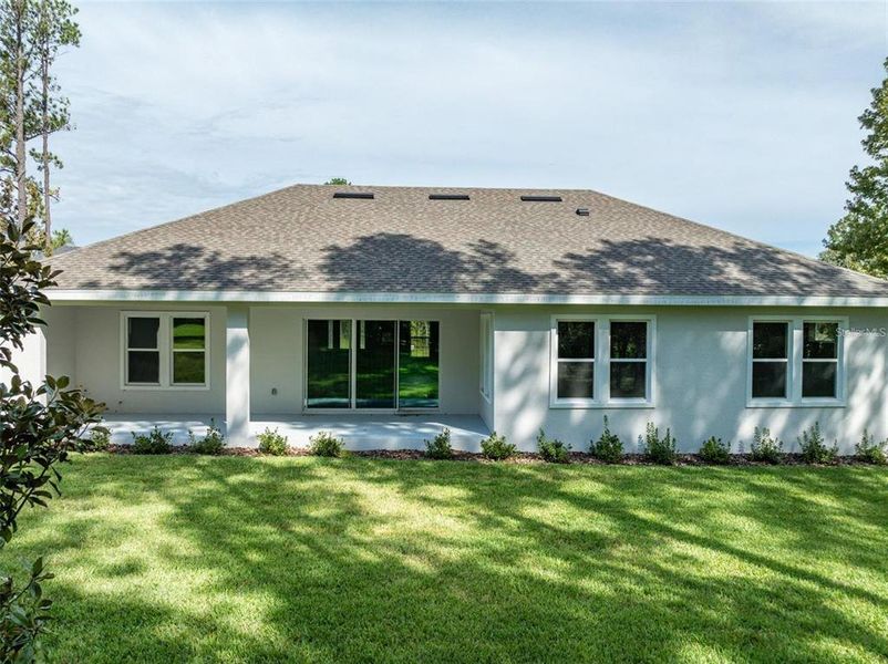 Exterior details and patio area of a home in Southern Hills Plantation, Brooksville (Image 3).