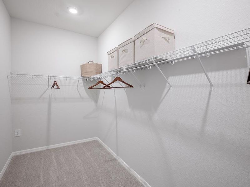 And, a walk-in closet provides storage convenience - Monroe by Highland Homes And, a walk-in closet provides storage convenience - Monroe by Highland Homes