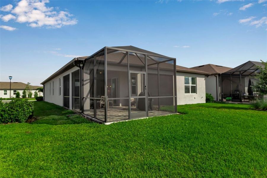 Front exterior of a new home in Del Webb BayView, Parrish, FL, highlighting curb appeal (Image 2). Front exterior of a new home in Del Webb BayView, Parrish, FL, highlighting curb appeal (Image 2).