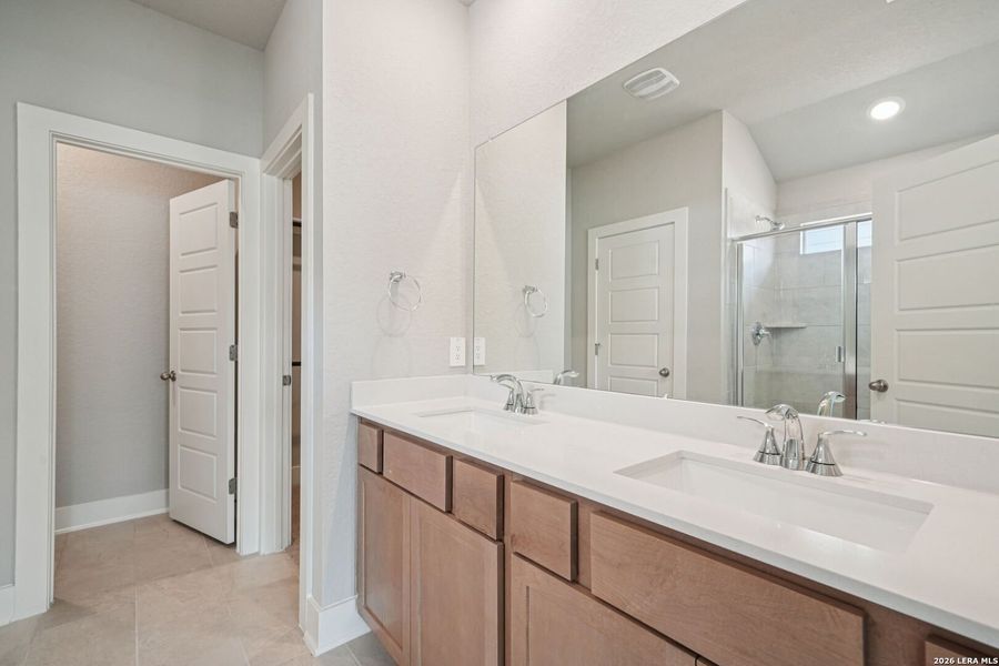 Furnished interior view inside a new home in Estancia Ranch - Classic Series, San Antonio (Image 13).