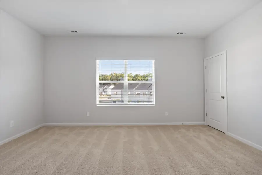 Spacious, unfurnished interior of a new home in West Main Townhomes, Sanford (Image 20).