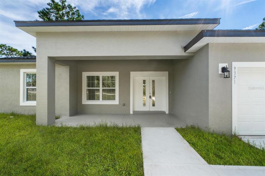 Front exterior of a new home in , Dunnellon, FL, highlighting curb appeal (Image 2). Front exterior of a new home in , Dunnellon, FL, highlighting curb appeal (Image 2).