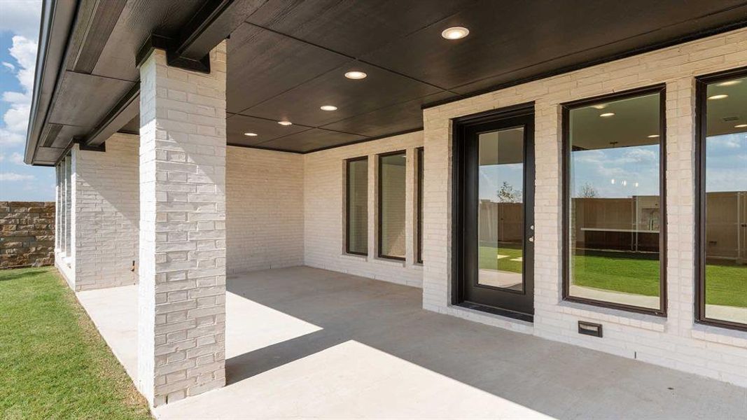 Exterior details and patio area of a home in Mosaic 50', Celina (Image 2). Exterior details and patio area of a home in Mosaic 50', Celina (Image 2).