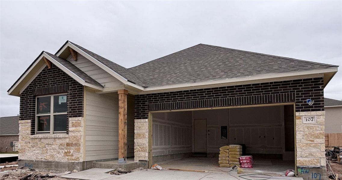 In-progress construction of a new home in The Colony 50s, Bastrop, TX (Image 2).