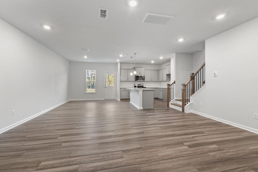 Spacious, unfurnished interior of a new home in Poets Walk, Whitsett (Image 13).