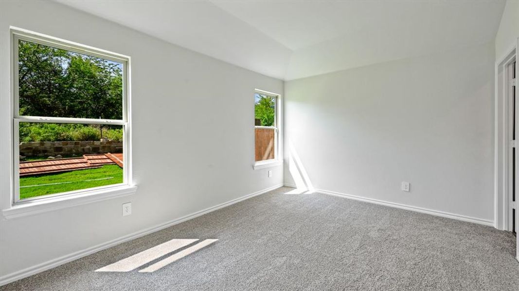 Neutral gray carpeting paired with light-toned walls