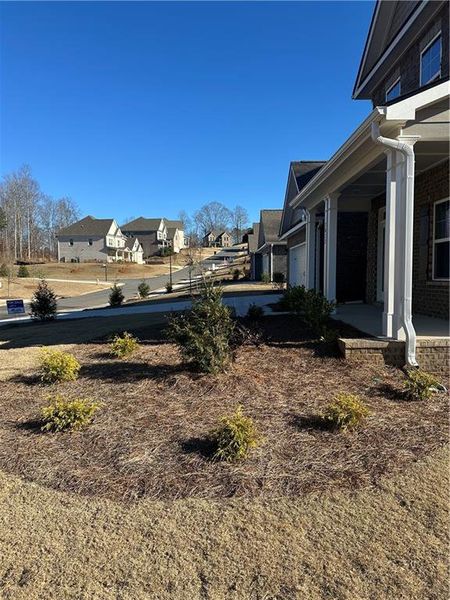 Exterior details and patio area of a home in Mirror Lake at South Harbour, Villa Rica (Image 4).
