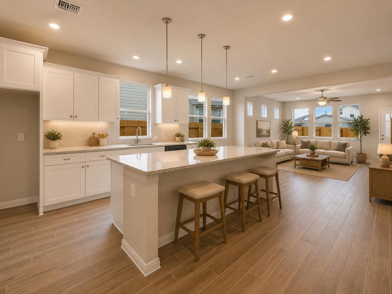 A contemporary open-concept space features a chef's kitchen flowing seamlessly into a well-lit living area, perfect for entertaining. A contemporary open-concept space features a chef's kitchen flowing seamlessly into a well-lit living area, perfect for entertaining.