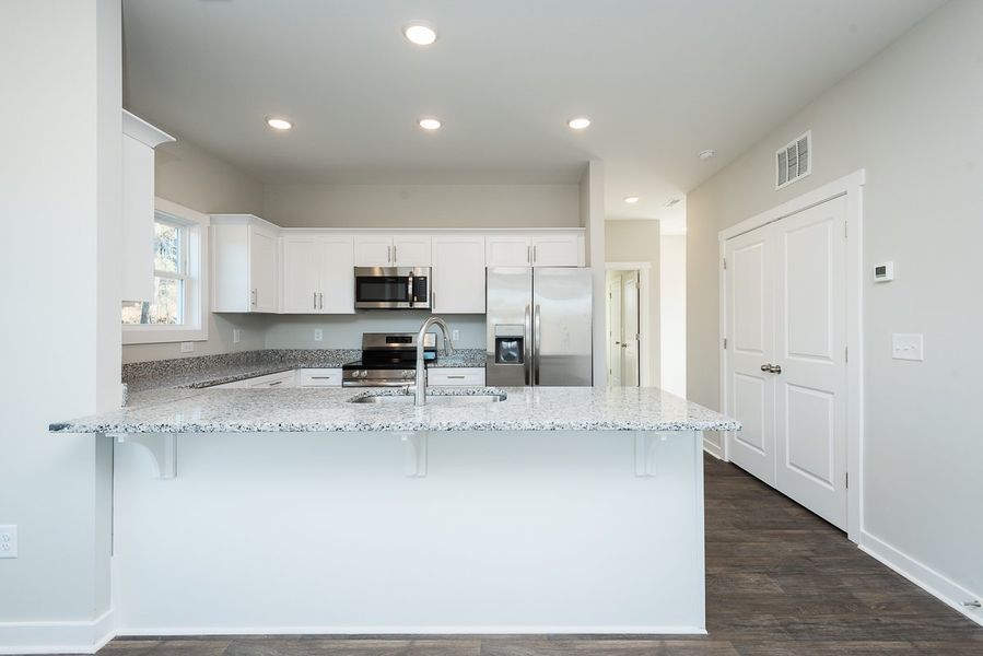 Representative furnished interior of a home built from the Monroe II by Foundation Home Builders LLC in Pinnix Loop, Burlington (Image 4).