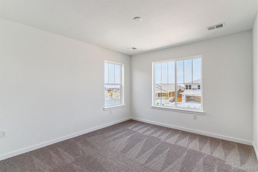 Spacious, unfurnished interior of a new home in Harvest Crossing, Aurora (Image 15).
