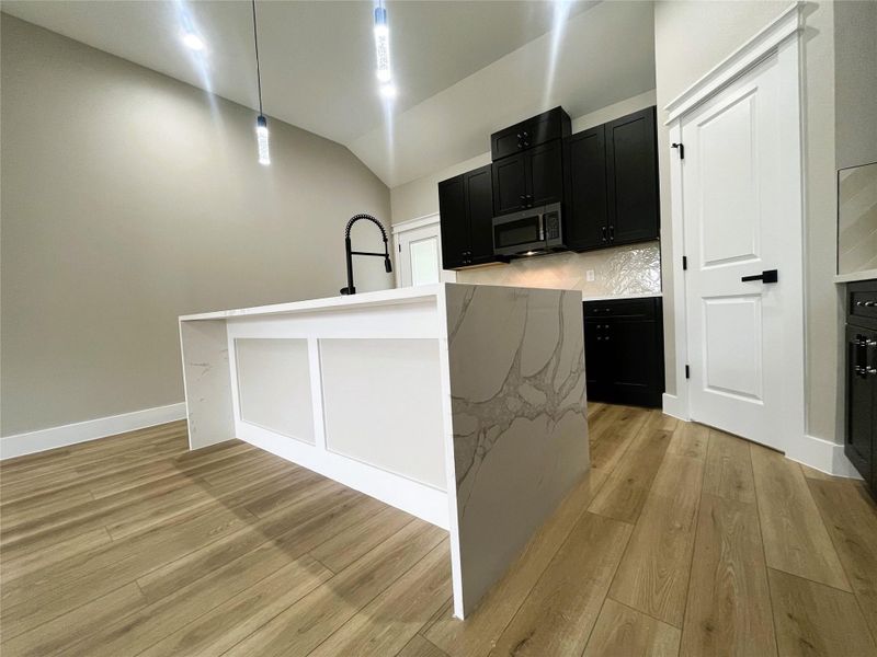 8914 Ivy Spring Ln waterfall kitchen island 8914 Ivy Spring Ln waterfall kitchen island