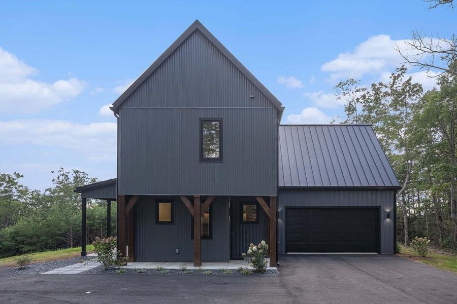 Front exterior of a new home in , Clayton, GA, highlighting curb appeal (Image 2).