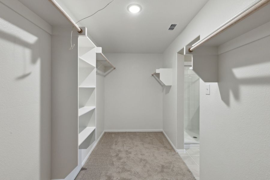 Primary Closet in the Harrison home plan by Trophy Signature Homes – REPRESENTATIVE PHOTO