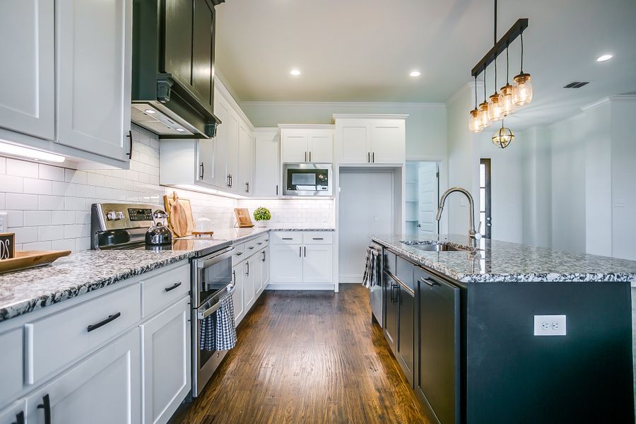 Representative furnished interior of a home built from the Refuge Lane by Trinity Classic Homes in Zion Trails, Poolville (Image 10).