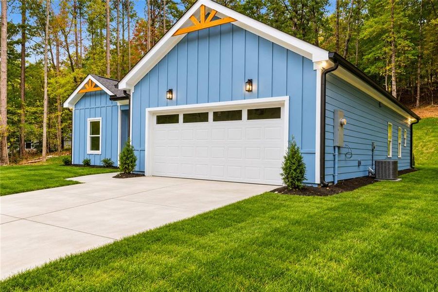 Front exterior of a new home in , Gainesville, GA, highlighting curb appeal (Image 23). Front exterior of a new home in , Gainesville, GA, highlighting curb appeal (Image 23).