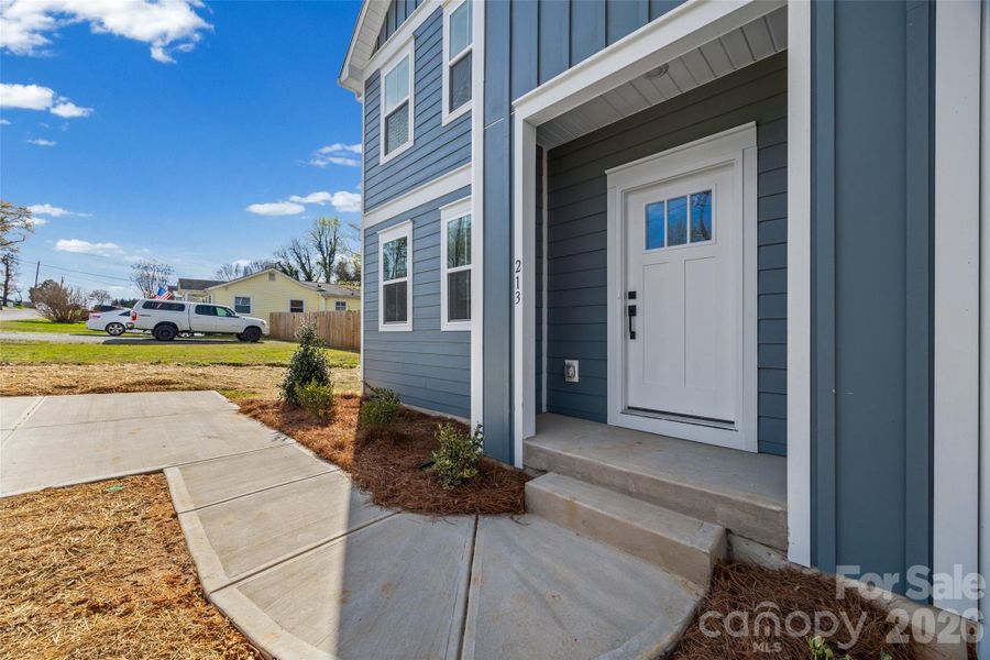 Exterior details and patio area of a home in , Belmont (Image 3).