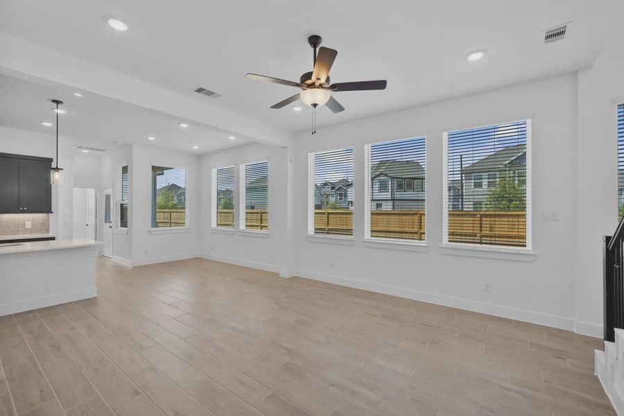 Representative unfurnished interior of a home built from the Versailles by Chesmar Homes in Meridiana Chateau, Manvel (Image 38).
