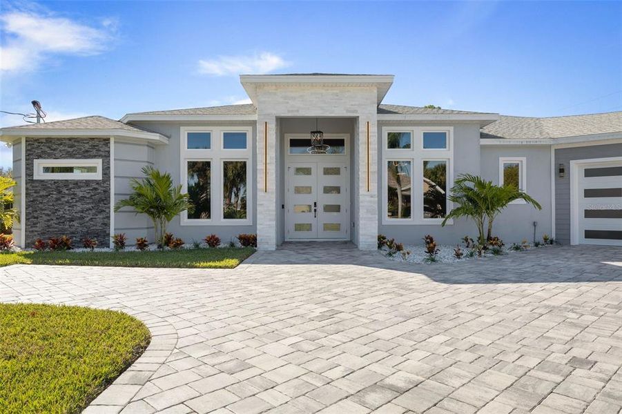 Front exterior of a new home in , Palm Coast, FL, highlighting curb appeal (Image 29). Front exterior of a new home in , Palm Coast, FL, highlighting curb appeal (Image 29).