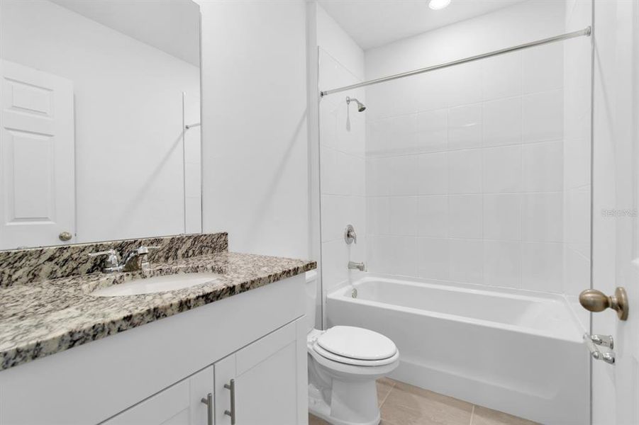 Furnished interior view inside a new home in Lawson Dunes - Signature Series, Haines City (Image 11).