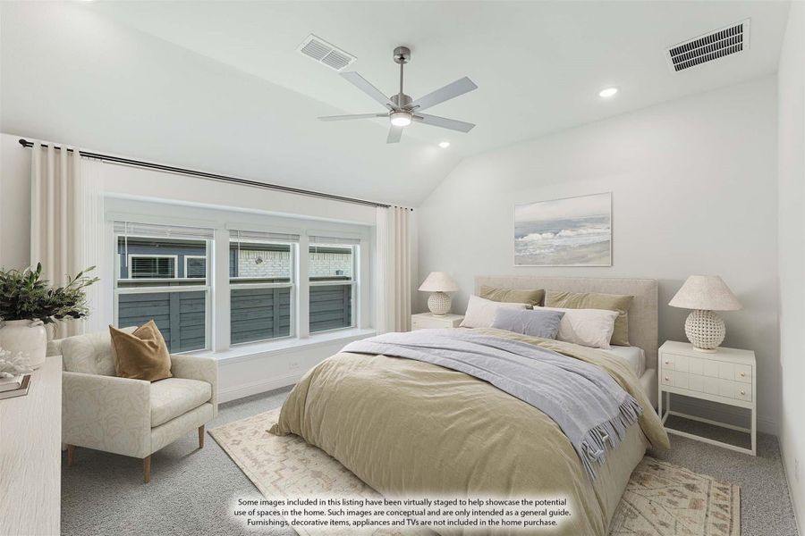 Bedroom with vaulted ceiling, ceiling fan, large windows, and neutral bedding with a sitting chair and area rug Bedroom with vaulted ceiling, ceiling fan, large windows, and neutral bedding with a sitting chair and area rug