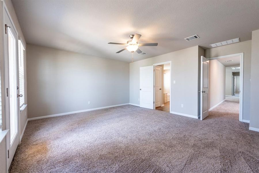 Primary Bedroom - carpeted