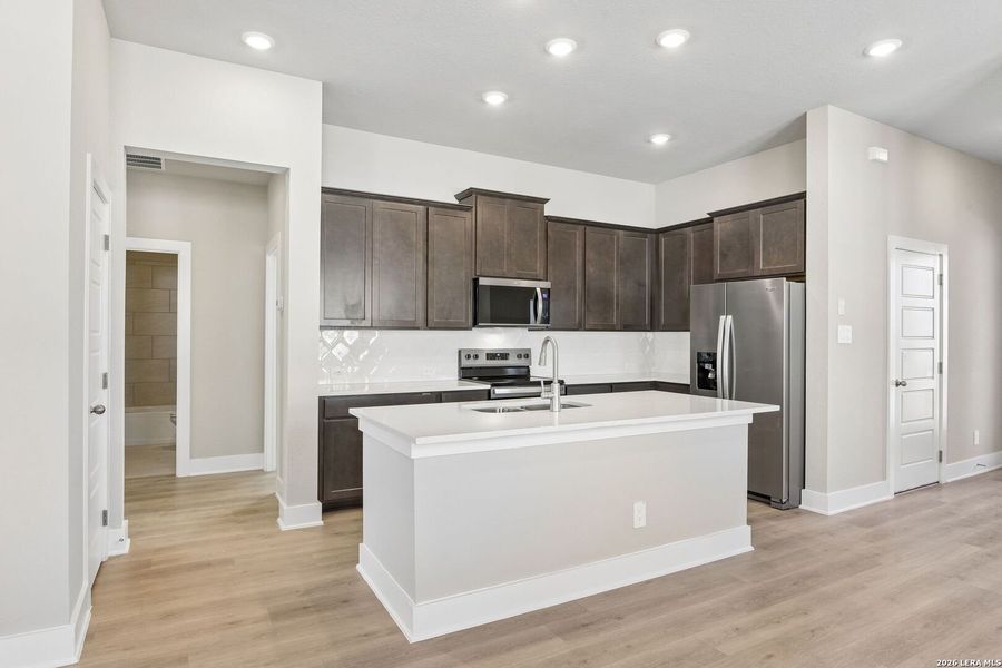 Furnished interior view inside a new home in Royal Crest, San Antonio (Image 9).