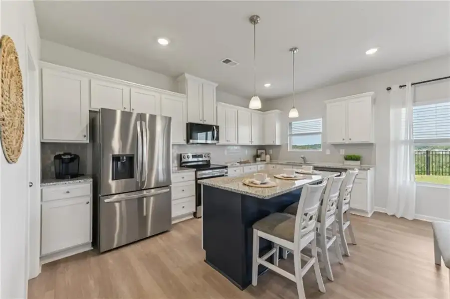 Furnished interior view inside a new home in The Hills at Cedar Creek, Winder (Image 15).