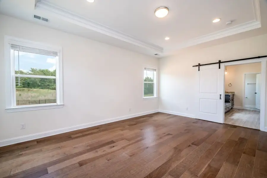 Representative unfurnished interior of a home built from the Harvard by Greybrook Homes in Deer Brook, Mooresville (Image 19).