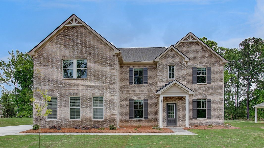 Representative exterior photo of a completed home built from the McKinley by DRB Homes in Cambria at Traditions, Hampton, GA (Image 2).