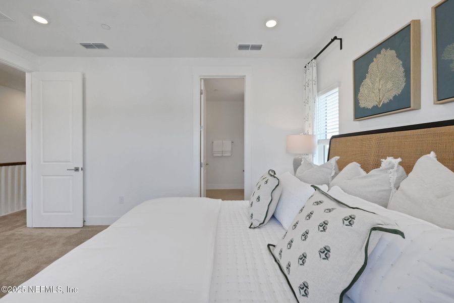 Furnished interior view inside a new home in North Beach Townhomes, Jacksonville Beach (Image 5).
