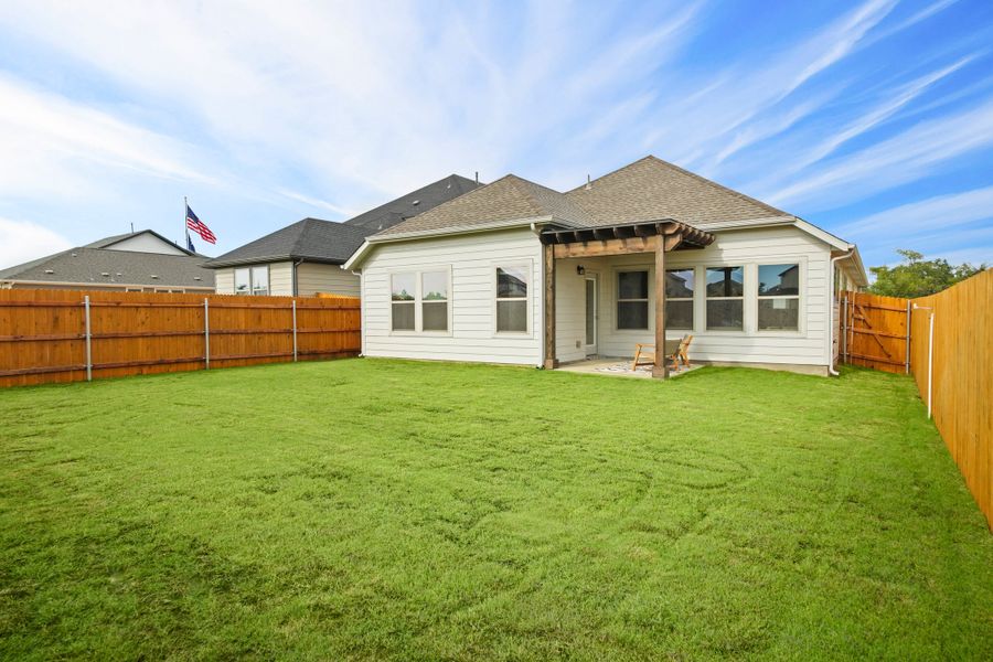 Patio in the Diamond home plan by Trophy Signature Homes – REPRESENTATIVE PHOTO