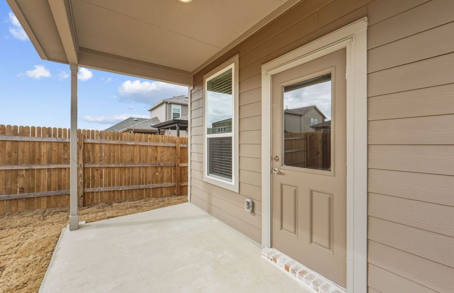 Exterior details and patio area of a home in Crosswinds, Kyle (Image 22).
