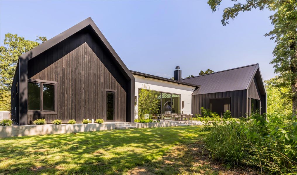 Front exterior of a new home in , College Station, TX, highlighting curb appeal (Image 26).