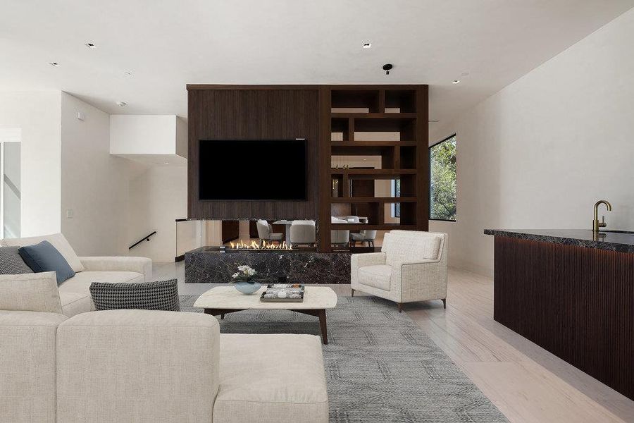 Living room with light wood-style floors