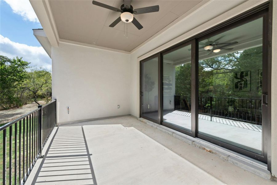 Balcony featuring ceiling fan Balcony featuring ceiling fan