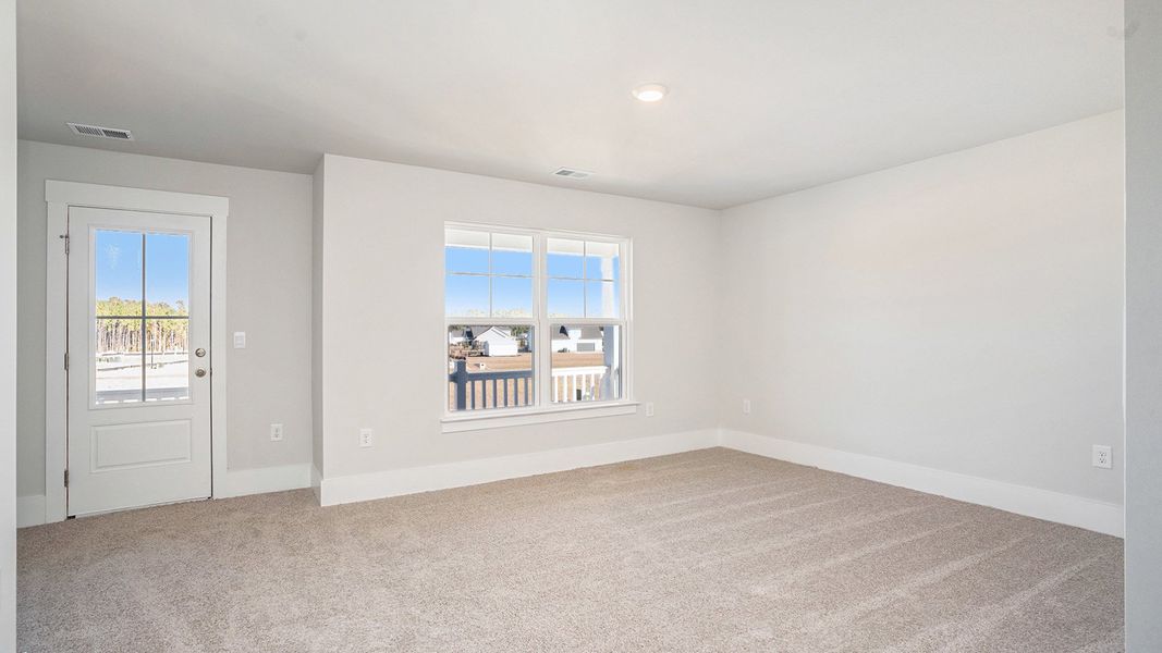 Spacious, unfurnished interior of a new home in Coastal Farms, Conway (Image 25).